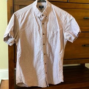 Medium J Crew short sleeved button up shirt. Violet or light purple in color.